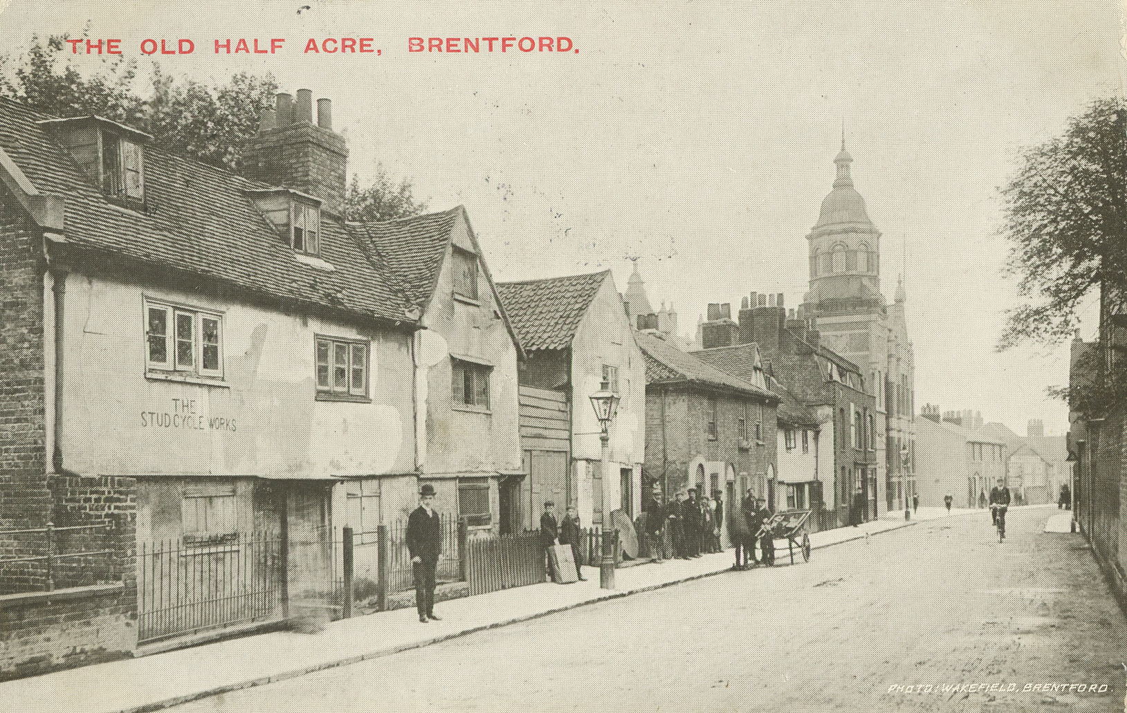 1900S early wakefields postcard half acre and vestry hall looking down towards the high street
